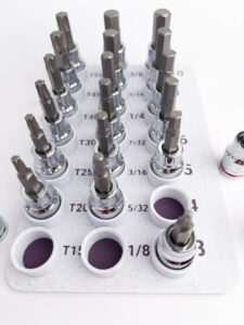 Full Duratech socket bit set organized in labeled tray, featuring Torx and hex bits in chrome finish with visible size markings for easy identification.